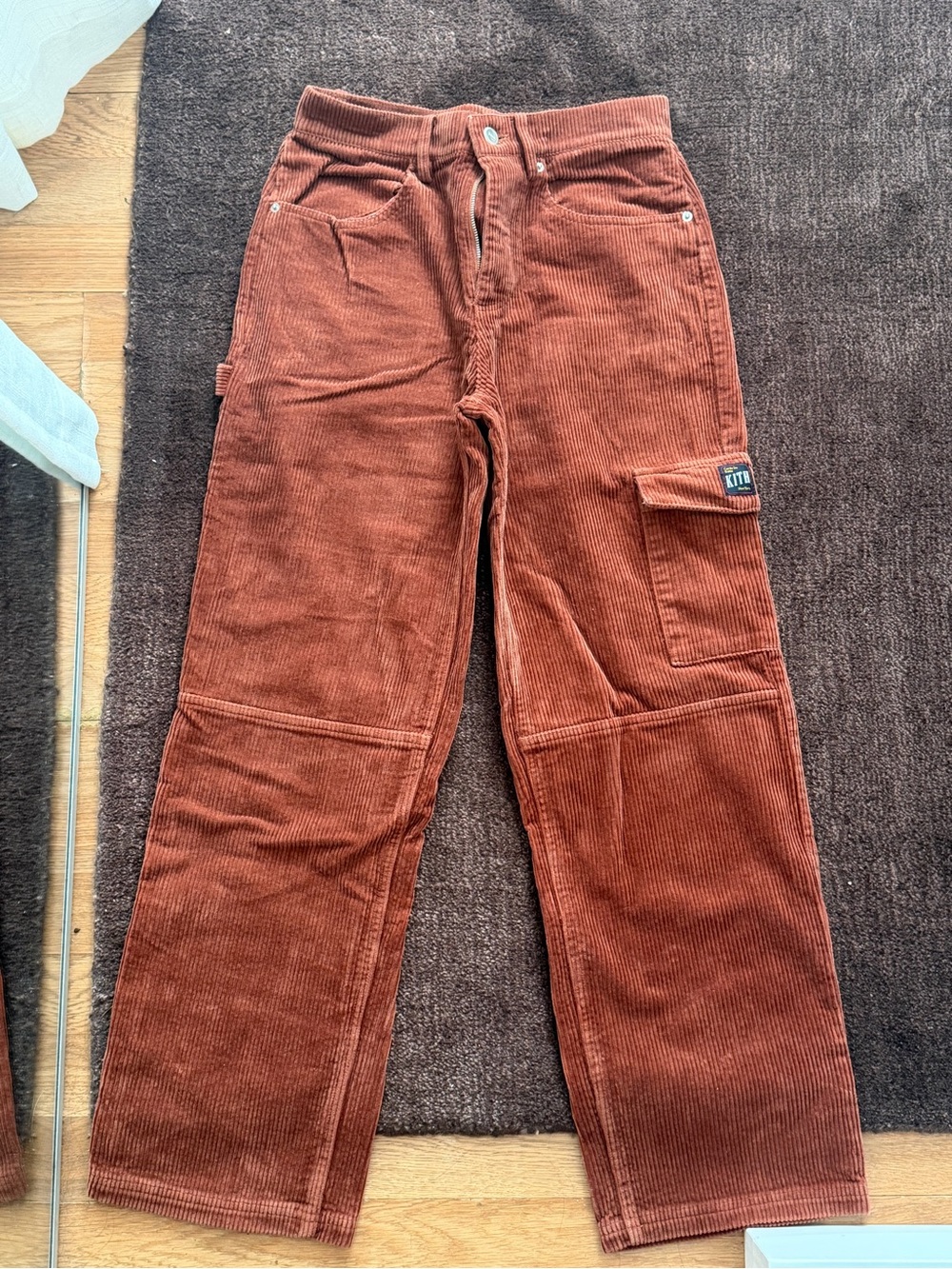 Kith Corduroy Flare Pants in Brick
